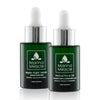 Night serum and face oil on green glass bottle with dropper.